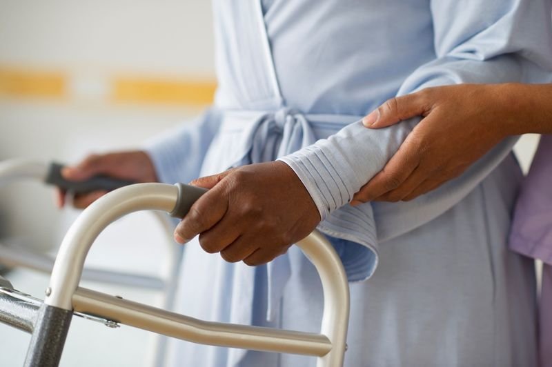 Aide assisting a client